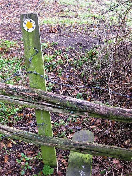 3a Barbed wire over stile